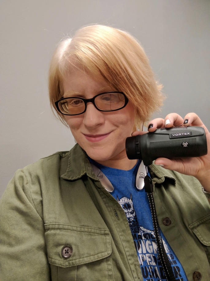 Person with Albinism showing off the Vortex monocular 